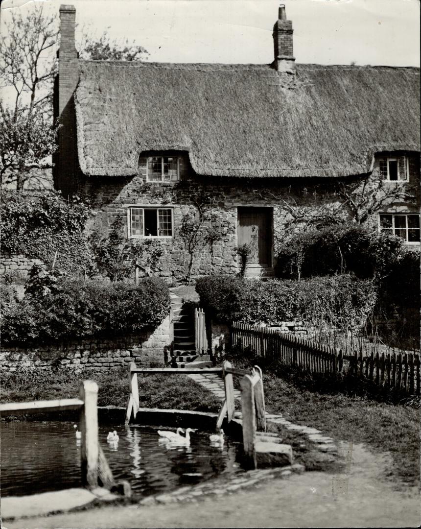 It's the Duck pond and a centuries old cottage in the Oxford area, at Wroxton