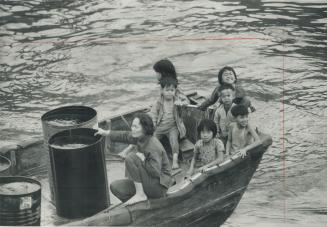 The water people of Hong Kong are born, live and die aboard the junks and small craft that populate the busy harbor