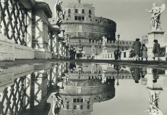 Best thing in life are free as this priceless view of Rome's Castel Sant' Angelo, reflected in a rain pool, shows