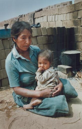 Life of squalor: Disease, like the tuberculosis that afficts Paulina Quispe and daughter FlorCeleste, is rampant in a country where untreated sewage is used as fertilizer