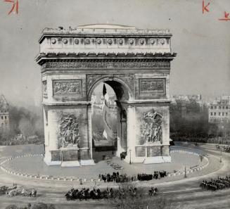 Tourists will see a different France, though such attractions ar K'Arc de Triomphe, above left, stand unchanged and unharmed by war