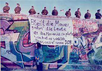 Gerta Klaus, 7,Asks East Berlin Border Guards when they will leave the Berlin Wall November 11