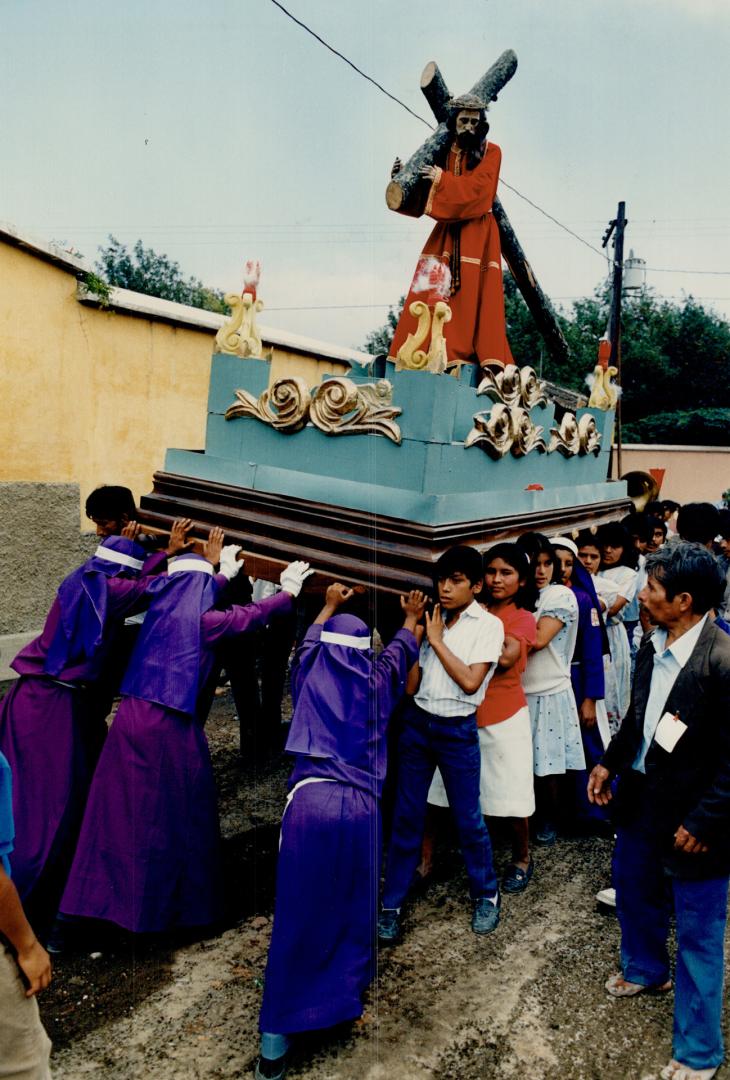 Left, a religious procession near the village of Antiqua