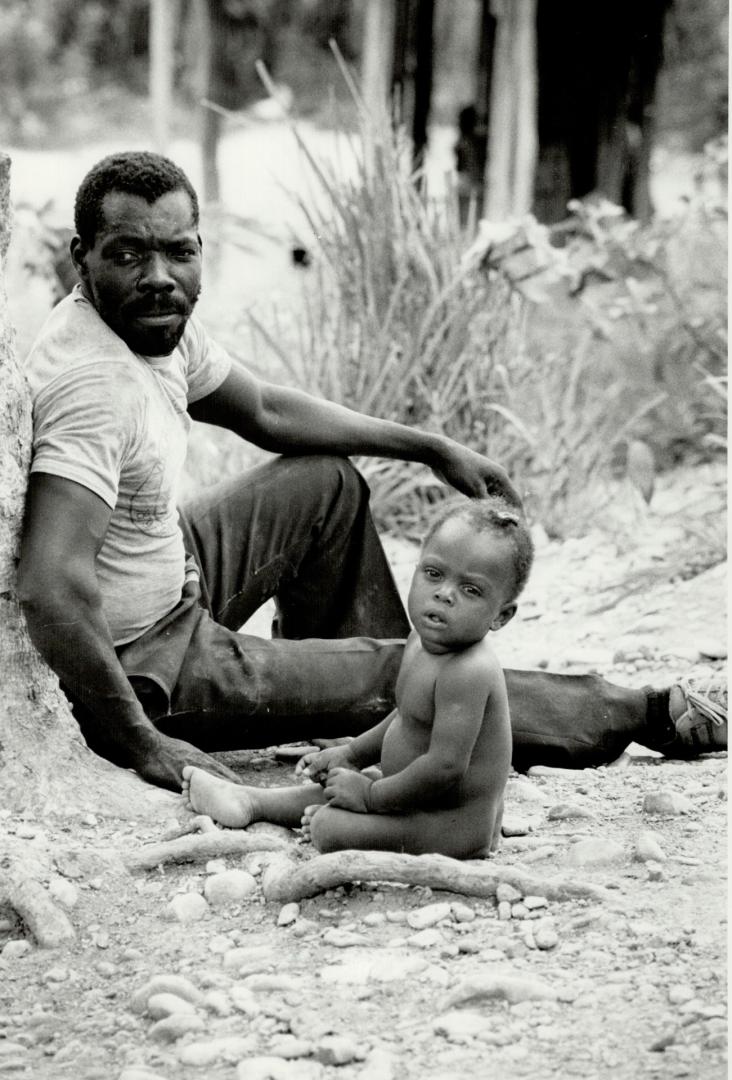 Farmer and Child. Haiti