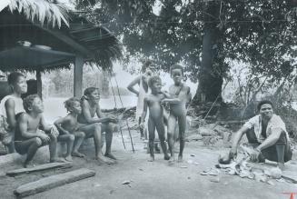 A Bush Negro village on the Morowijne River in Surinam is much like West African villages where the ancestors of these people were abducted long ago