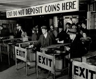 Number Three?, On The Mark-Turnstiles finally reached, New York subway patrons pay their nickels and take their choice Bronx, flushing or Brooklyn. Th(...)