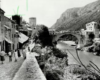 The most famous sight in Mostar is the ancient white stone bridge over the Neretva River built by the Turks more than 400 years ago