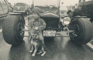 Their Favorite: Bryan Gault, 3, of Mississauga and dog Sparky like the look of this souped-up 1923 Ford Model T owned by friend Dan Everton of Scarborough