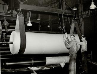 Reel Room, in basement level directly under presses, feed rolls of paper into presses automatically