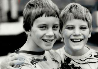 Eight-Year-Old Steven Veals (left) plans to buy himself and his brother, Scott, 9, dreams bikes with the $2,000 he won in The Star's Jokers Wild conte(...)
