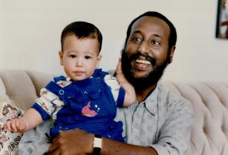 Ahmed Qorane Mohamed and son Somalian Refugee