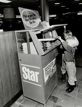 It talks: Jeffrey Nocent, 4, and brother Scott, 2, really did hear voices when they bought a Star at Union Station yesterday