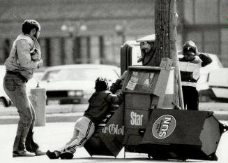 News boxes tumbled, Newspaper boxes throughout the city were toppled by yesterday's windstorm