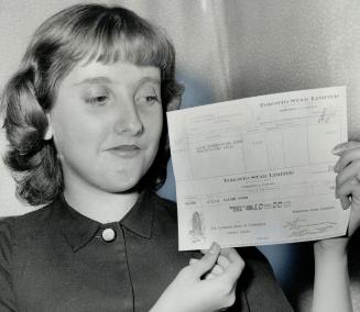 Prize winner Elaine Hinan holds $10 cheque won in Star essay contest held in conjunction, North Toronto Horticultural society