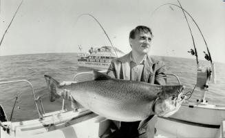 Catchy catch, The fishin' was fine, by anyone's scale, and Ivan Sut - aboard the Charter I - had this 17-pound coho salmon to display yesterday as his entry in The Star's Great Salmon Hunt