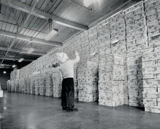 Dream wish: A needy child's dream for Christmas is this warehouse lines with Star gift boxes that will be filled and delivered to anxious boys and girls Christmas Eve