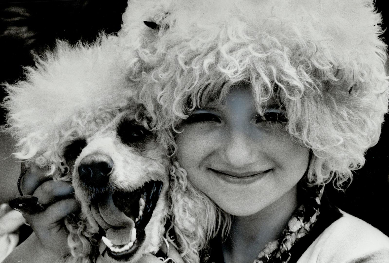 Vanessa Telepcak, at right (or is it left?), entered 9-year-old Brandy, at left (or maybe right), in the look-alike contest