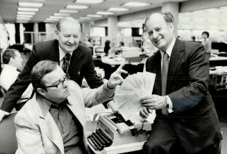 Bowlers come through: Bowlerama president Jack Fine presents cheques to Star sports columnist Jim Proudfoot yesterday while Bowlerama promotions director Wally perlik looks on