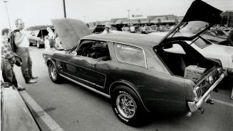 One of a kind: Brian Manuel stands by his Mustang station wagon built by him and high school students
