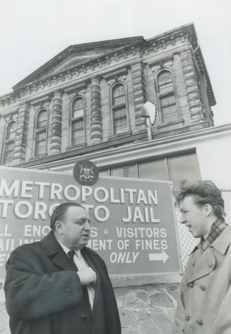Lawyer Lou Kesten, left, and Thomas Wade Borden stand outside the Don Jail, where Borden had been imprisoned twice