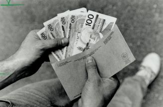 The bait, Envelope and five $100 bills were given by a Star reporter to liquor board Inspector who said, Thank you, and left the meeting with the package