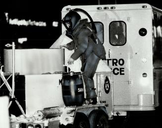 Touchy job: Metro's police bomb squad went to the Bloor-Yonge subway station last night on a tip that an explosive parcel was hidden in a locker