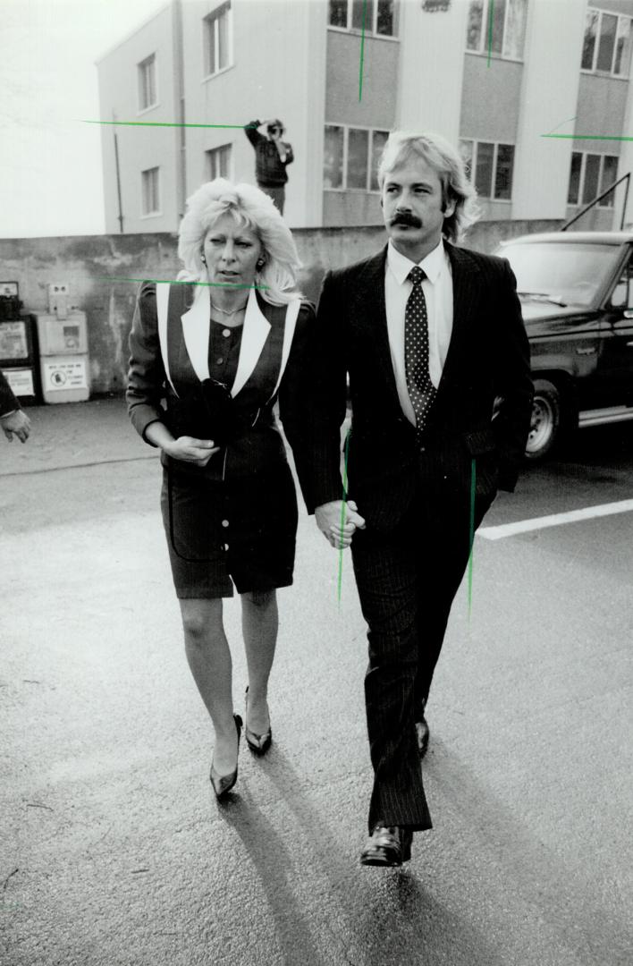 Free on bail: Michael Bovay leaves Whitby courthouse today with an unidentified companion