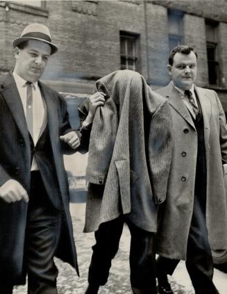 Charged with murder of Toronto tailor Morris Mayzel, who was slain in his shop Nov