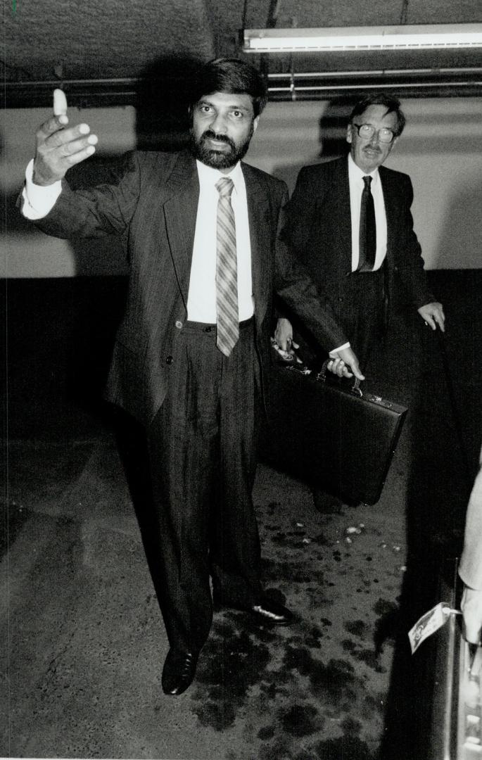 Under Fire: Dr. Chikmagalur Mohan, facing a disciplinary hearing, over sex assaults, gestures yesterday in the College of Physicians and Surgeons garage