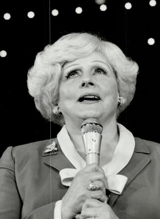 Mary Kay Ash: She believes in pink, Warm Fuzzies, lots of jewelry - and selling