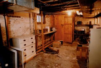 Well Aged: Left, the Asplers' basement had a tiny, makeshift wine cellar before they renovated