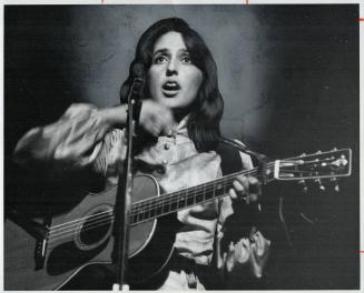 Joan Baez at Massey Hall. Good material plus that rare, strong voice