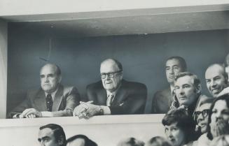 Harold Ballard, the president and general manager of Maple Leaf Gardens, sentenced to three years for theft and fraud, sees his first live hockey game(...)
