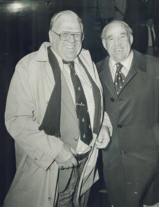 We're No. 16! Leafs' owner Harold Ballard and vice-presient King Clancy show their delight on arriving in Toronto today