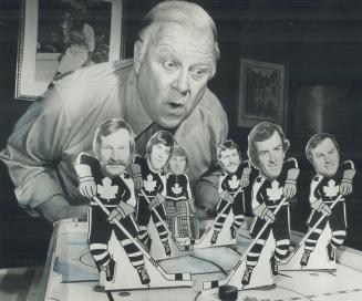Maple leafs' president Harold Ballard tries table hockey in attempt to solve team's problems