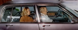 Yolanda Ballard rests a hand on Harold Ballard's shoulder after they ate lunch at the Westbury Hotel