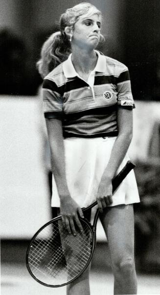 Digusted: Carling Bassett of Toronto looks dejected after shot against Billie Jean King during losing exhibition match last night