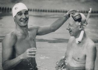 By George, It's Alex Bauman! Olympic gold medalist swimmer Alex Bauman and 66-year-old George Cowie enjoy a dip in North York's Douglas Snow Pool yest(...)