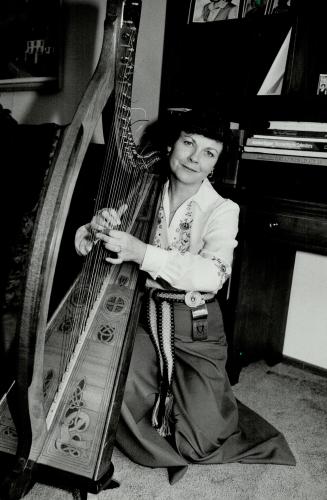 One happy harpist: Sandra Beech, plucking her Celtic harp, was surprised and thrilled April 14 when she won a Juno Award for best Canadian children's album, for her record Inch by Inch