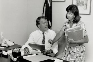 Catching up: New Community and Social Services Minister Charles Beer with Bunny Godman, constituency co-ordinator for Beer, in his Aurora office