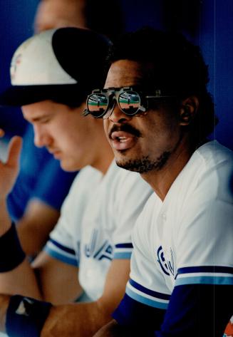 New Look: George Bell had on his new prescription eye wear, complete with flip-up sunglasses, but sat out series finale against Boston at the SkyDome