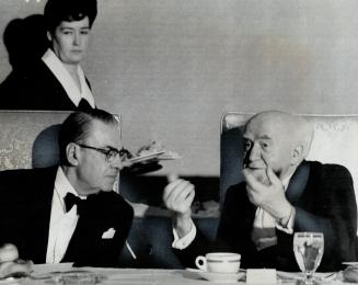 Ben-Gurion and Paul Martin Liven talk with gestures, The two of them kept up an animated conversation throughout dinner