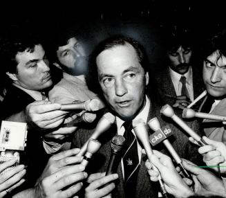Besieged over his brutal budget in 1983, centre