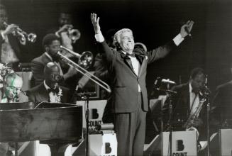In the spotlight: A still-scintillating Tony Bennett, backed by the 18-piece Count Basie Orchestra, plays to a mostly-full Roy Thomson Hall last night