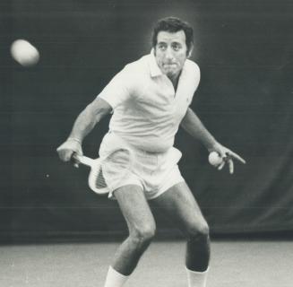 Singer Tony Bennett in action on the tennis courts at York Racket club