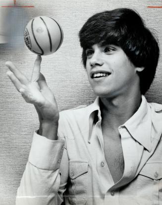 The miniature basketball expertly twirled by 21-year-old Robby Benson isn't just a gimmick to promote actor's new movie One On One, opening tomorrow a(...)