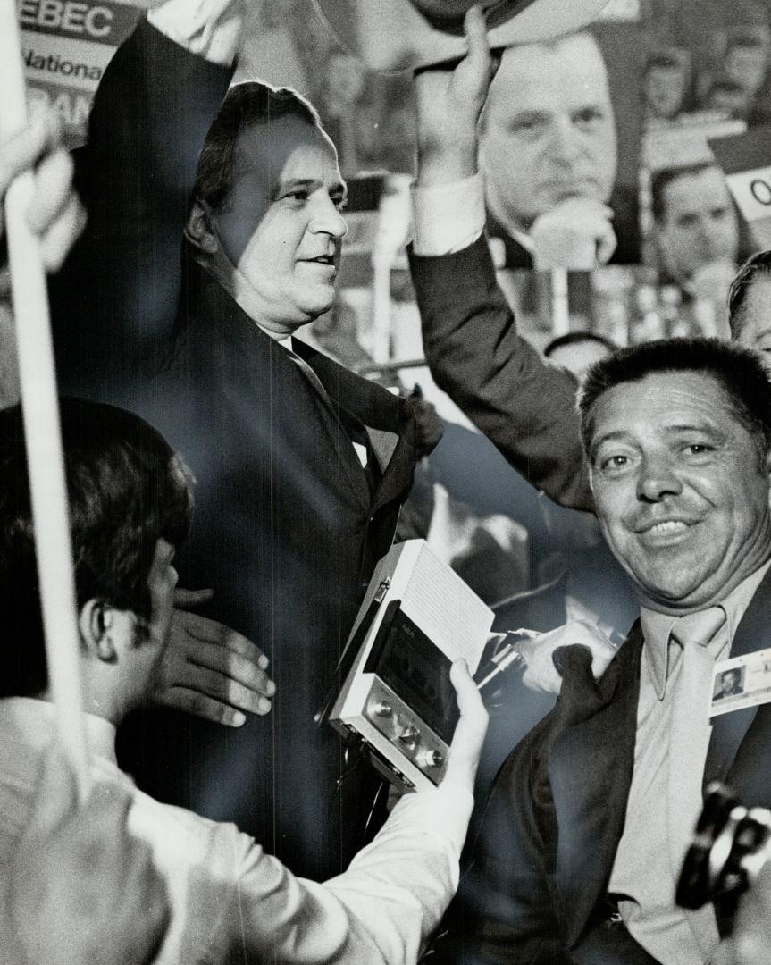 Cheering supporters all but mob Premier Jean-Jacques Bertrand who won confirmation as leader of the Union Nationale in Quebec city Saturday. He beat o(...)