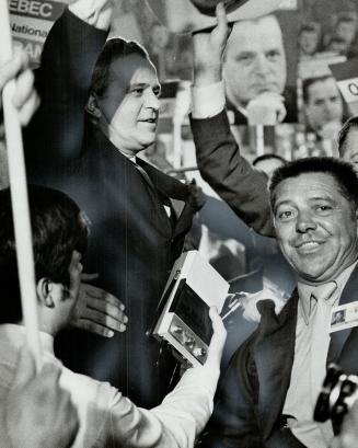 Cheering supporters all but mob Premier Jean-Jacques Bertrand who won confirmation as leader of the Union Nationale in Quebec city Saturday. He beat o(...)