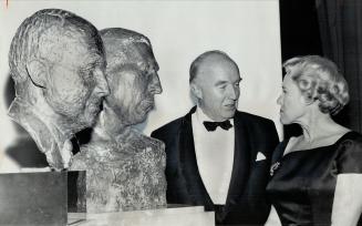 Dr. Charles Best and Lady Banting with Bronze Busts of Banting and Best