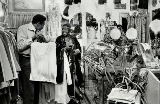 Salome Bey shops for clothes at From Here to Eternity in the Beaches with the help of co-owner Thomas Drayton, a long-time friend